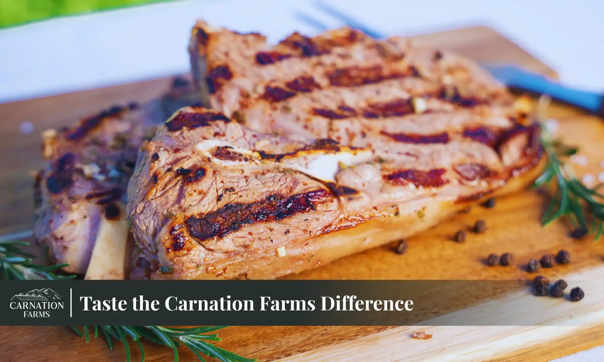 Grilled pasture-raised meat on wooden board with herbs